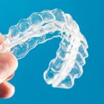 invisalign-vs-smile-direct-club-caring-dental-office